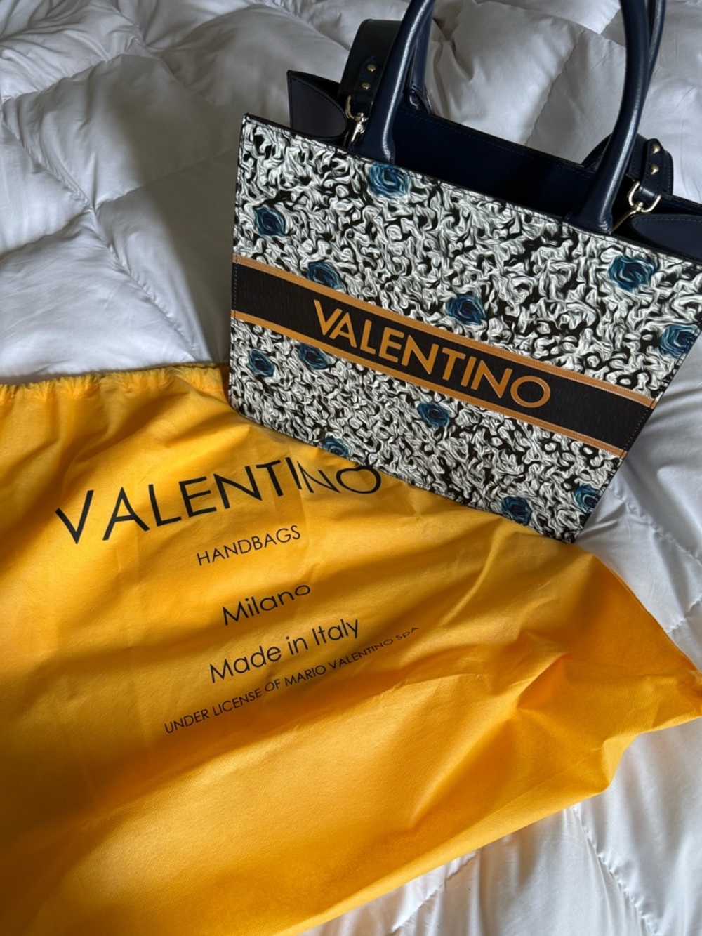 Valentino Blue, Gray and White bag.
